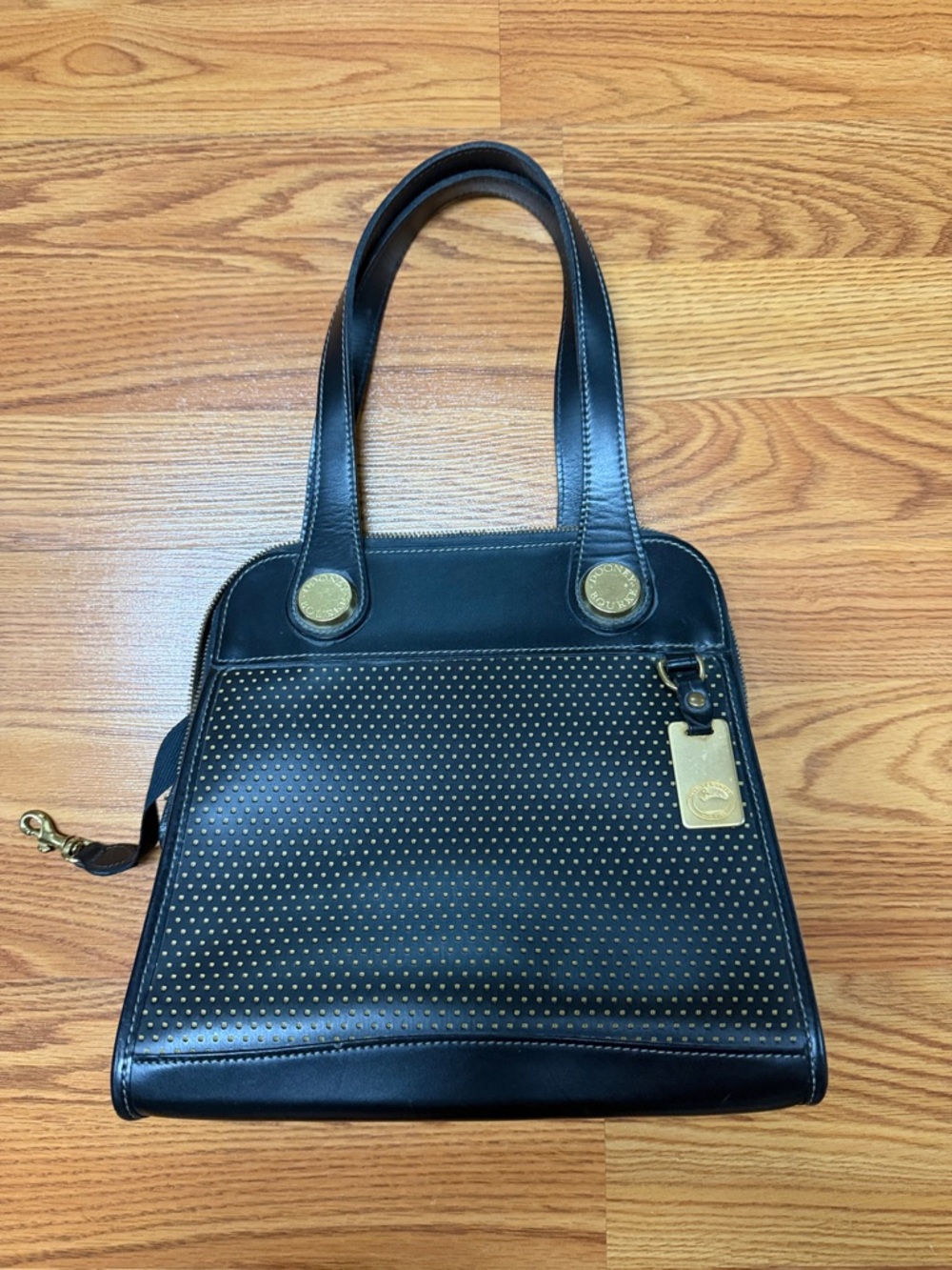 Vibtage Dooney and Bourne Black Perforated Leather Tote with Gold Accents